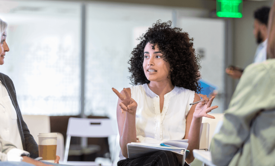 Woman discussing during an HOA meeting