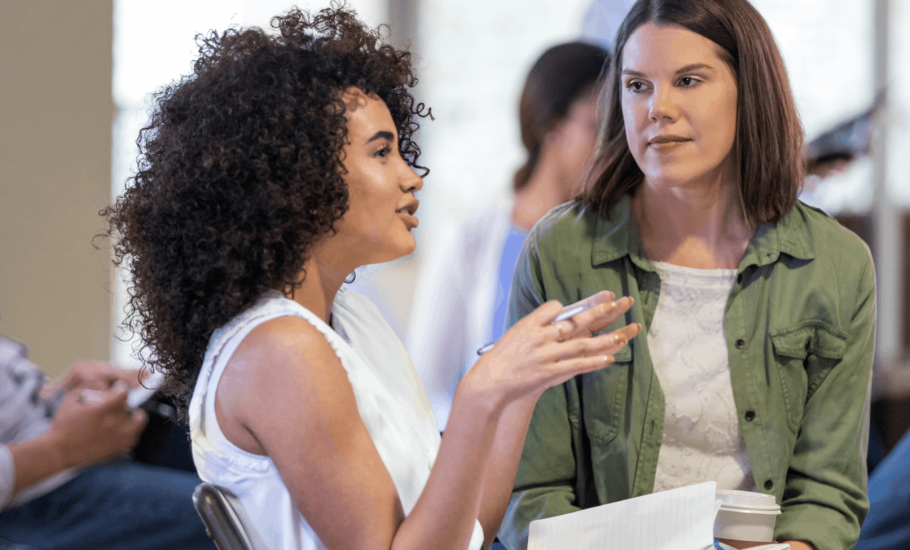 Young woman talking during an HOA meeting